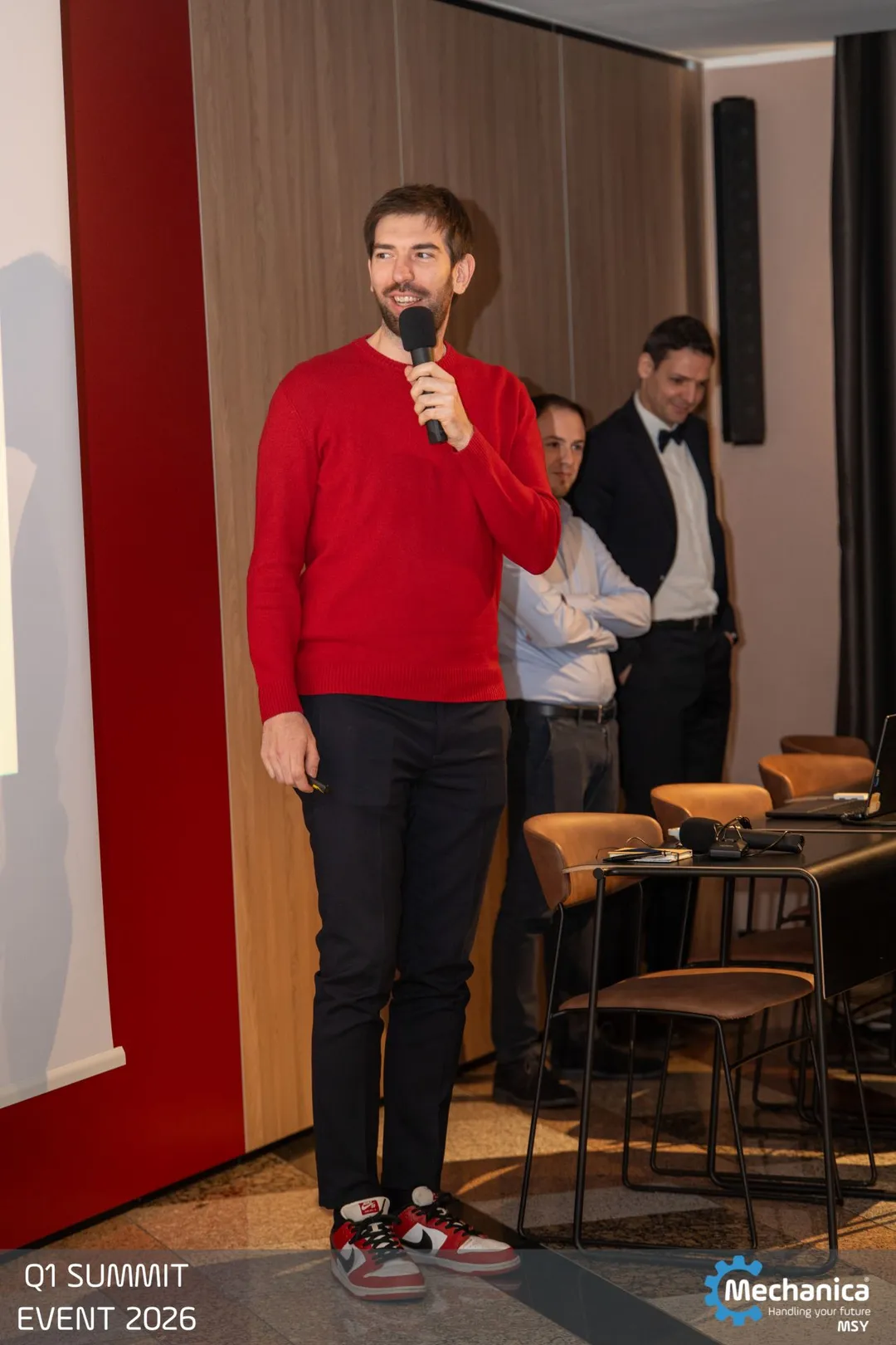 Colleague taking a question during the summit